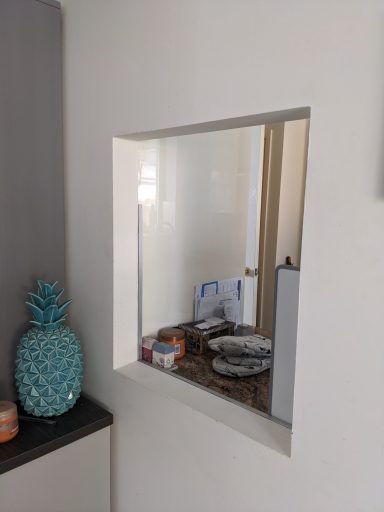 Dining room serving hatch before shutters